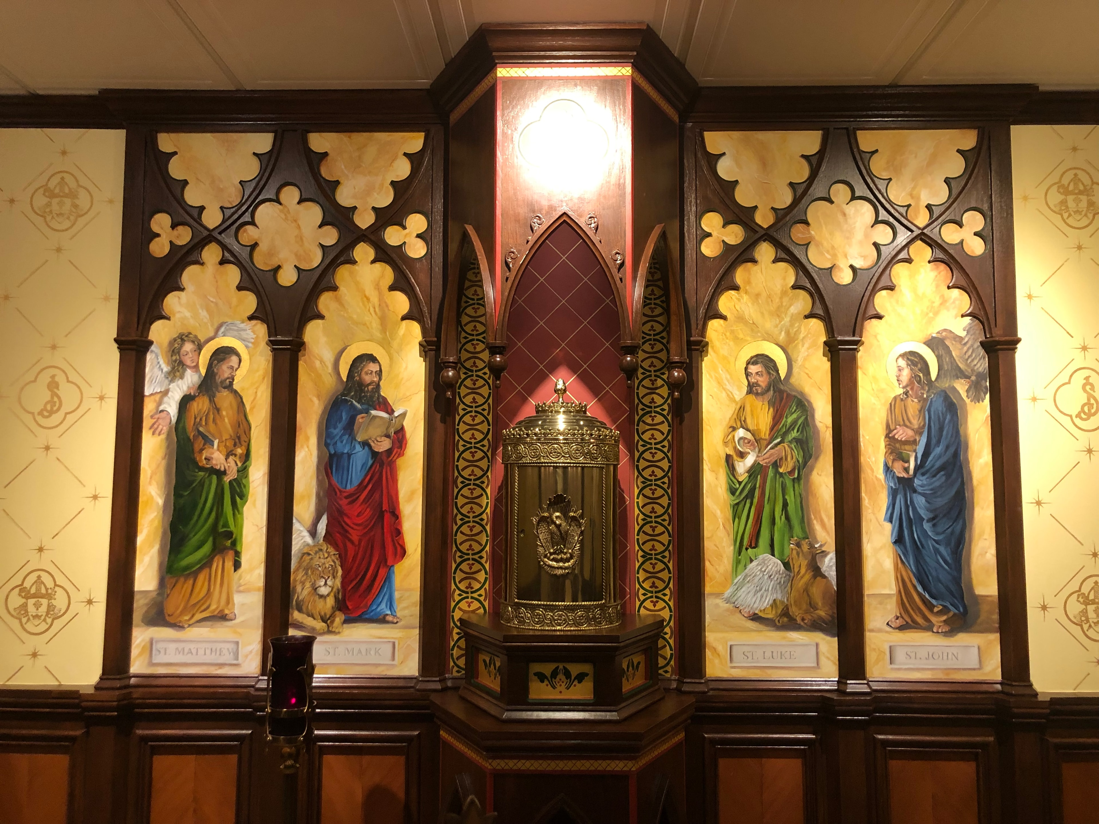 Four Gospel Writers mural with tabernacle at the Bishop's Chapel