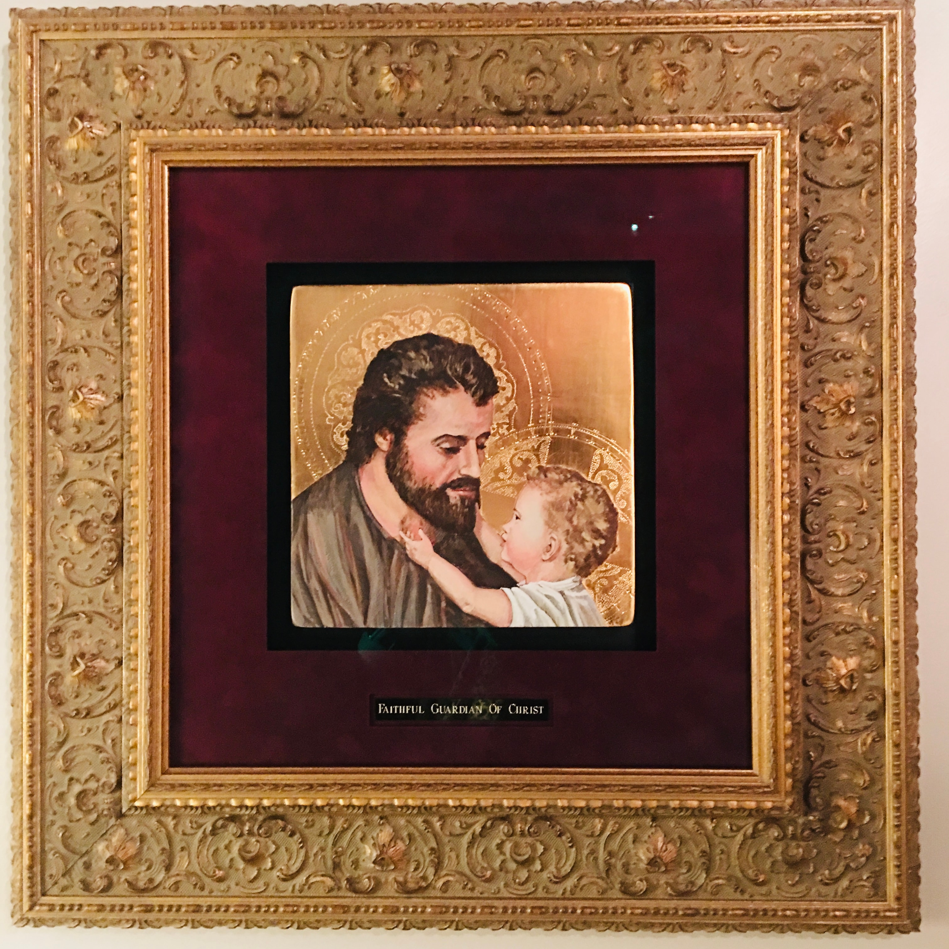 St. Joseph with Child Jesus icon on gold leaf in ornate gold frame