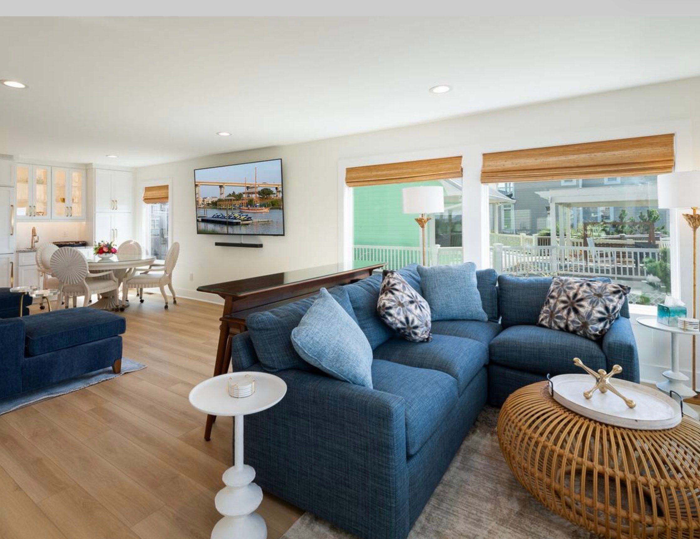 Modern coastal living room with blue sectional — Holden Beach NC