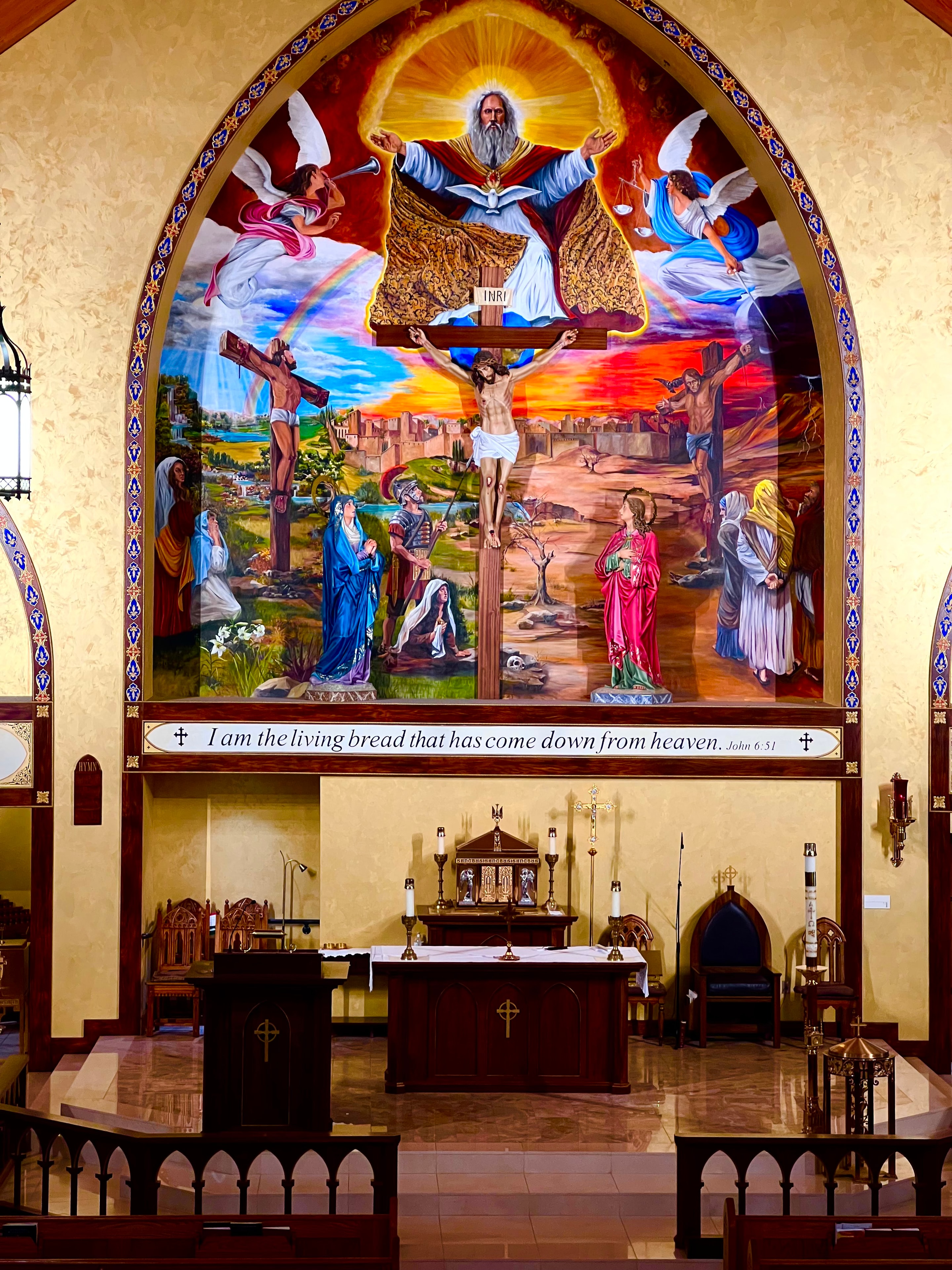 Ornate church altar with religious mural at the Church of the Immaculate Conception