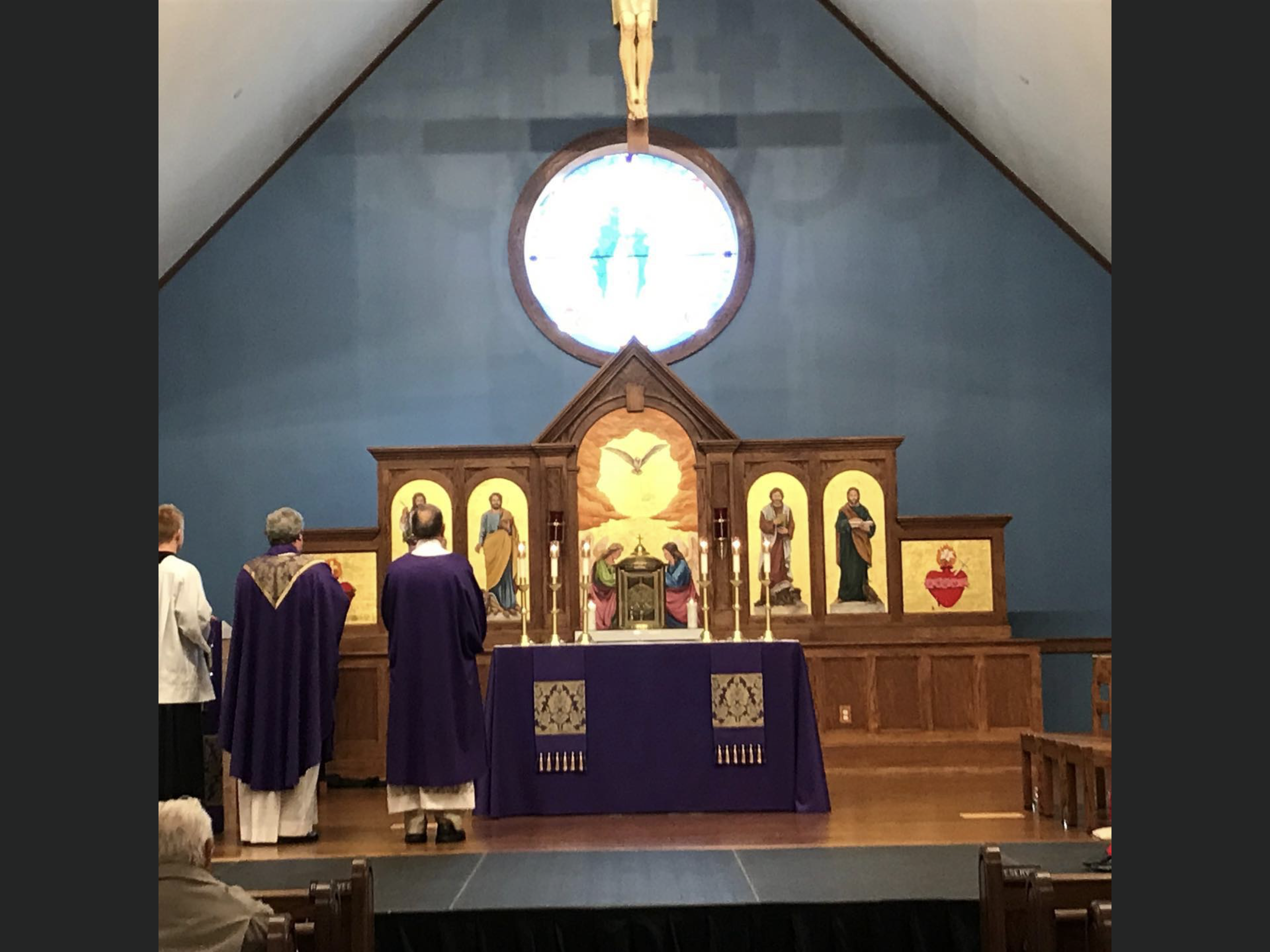 Wide sanctuary view during Mass at Our Lady of Grace