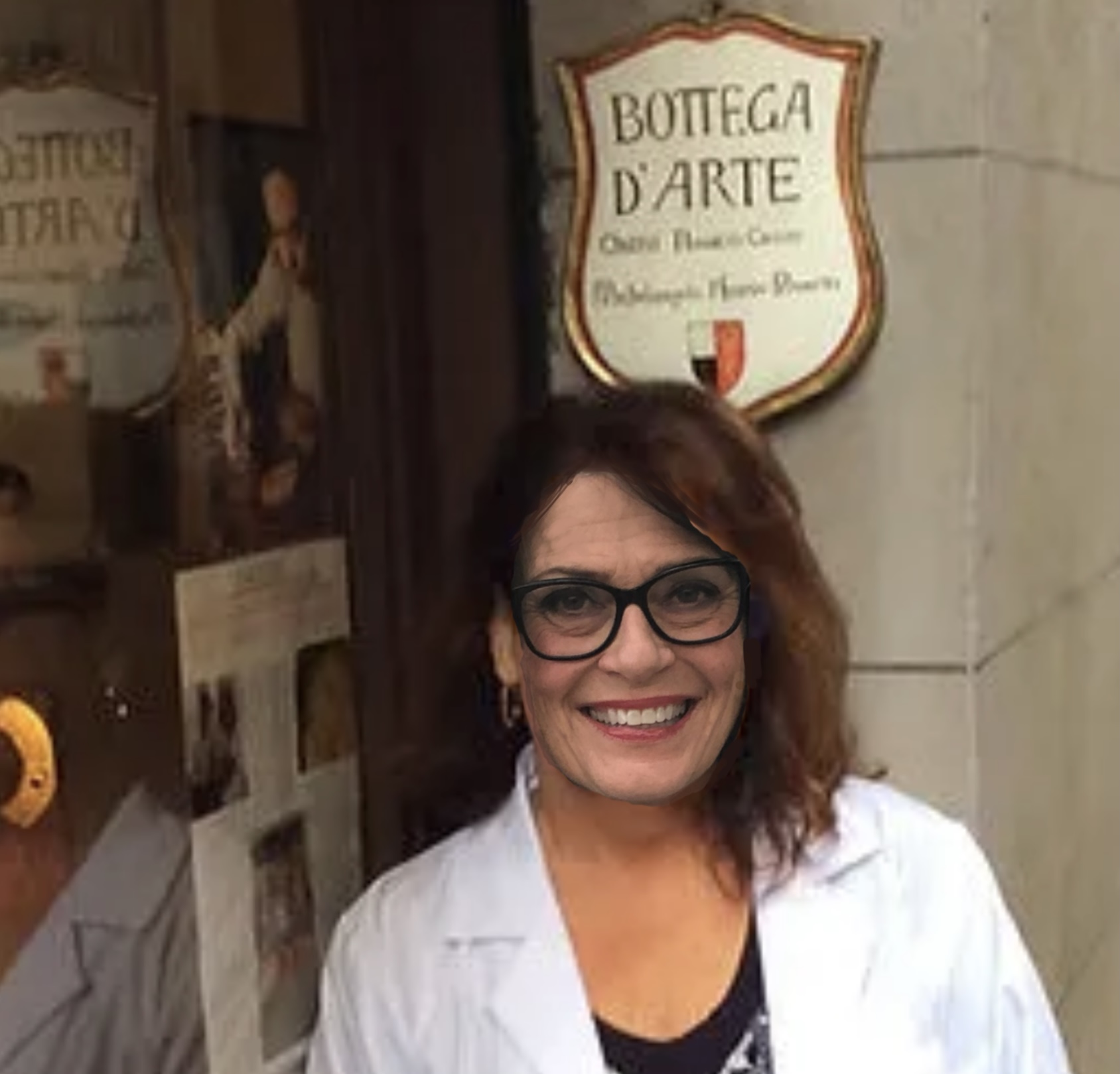 A woman standing in front of a store sign.