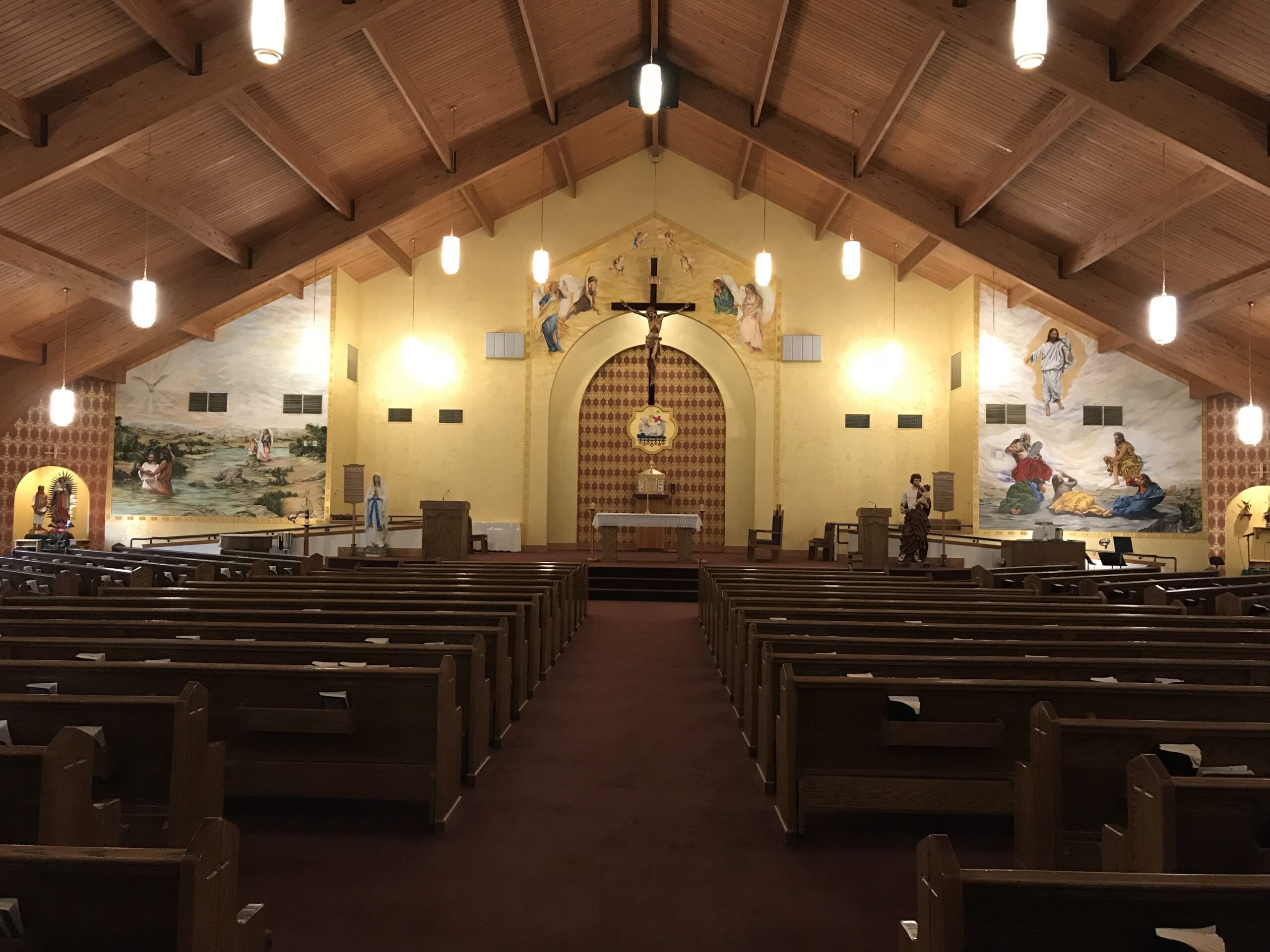 A church with many pews and a large cross