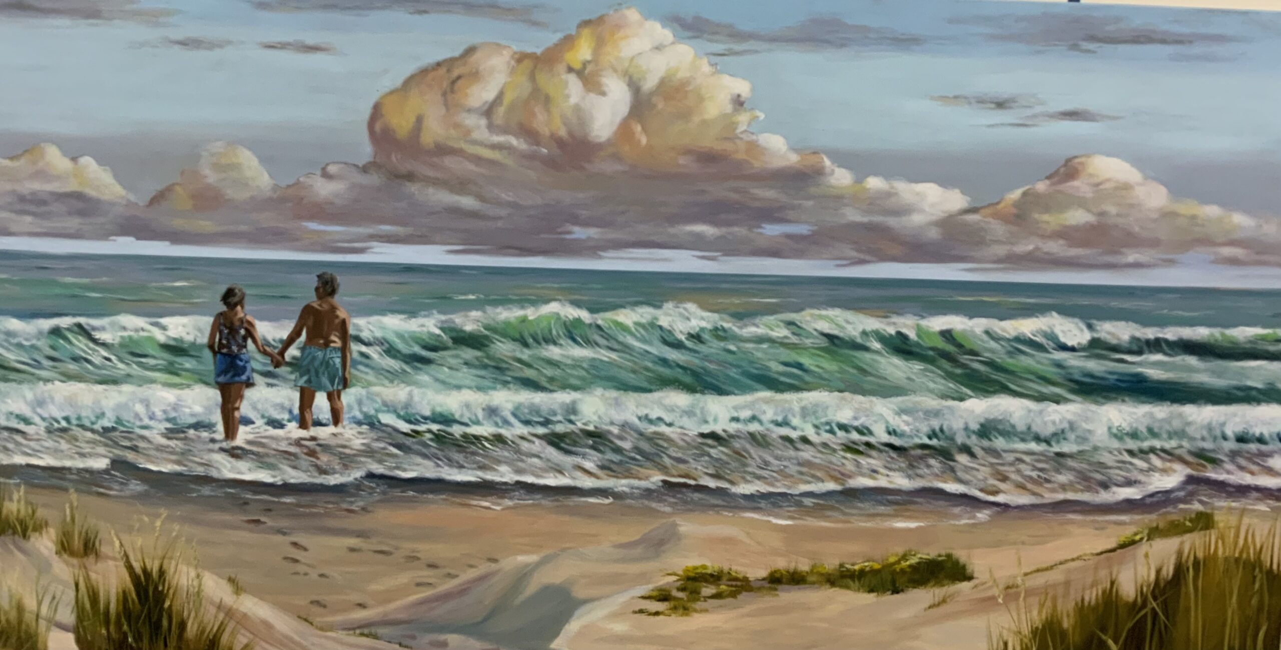 A painting of the ocean and clouds in the sky